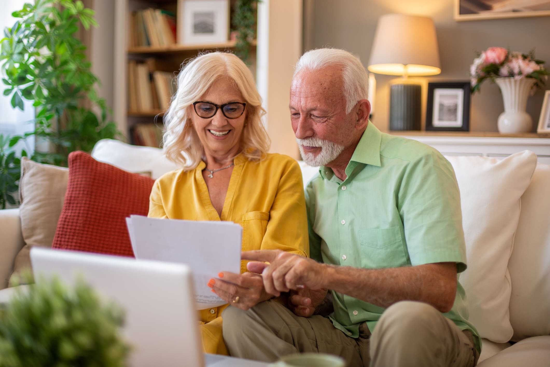 Senior couple enjoying online content together